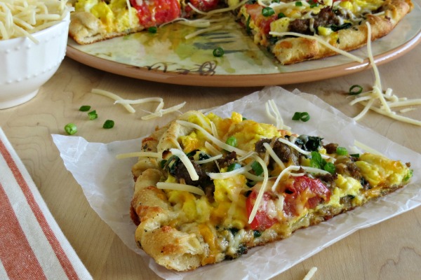 This breakfast pizza is a nice change from your regular breakfast routine. Sausage, spinach and spices ensure that each bite is packed with flavor!