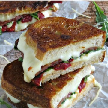 Sun dried tomatoes, arugula, mozzarella and Parmesan cheese make this BLT recipe so much more than the ones that you grab at your local sandwich shop!