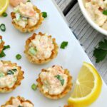 This cold shrimp dip comes together quickly and is sure to be a hit at your next party! A homemade dressing provides just the right amount of tanginess!