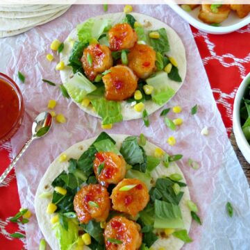 I love shrimp tacos and these are just delicious. With just a little bit of crunch and a lot of flavor, these sweet & spicy shrimp tacos are sure to please