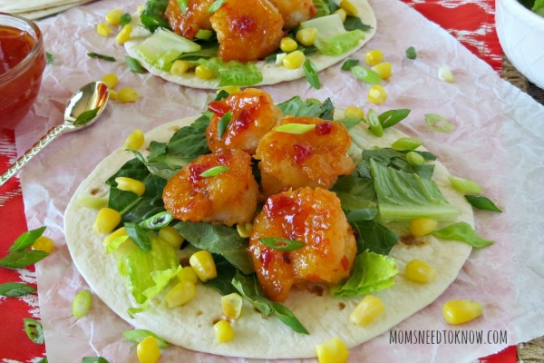 I just love this shrimp tacos recipe. With just a little bit of crunch and a lot of flavor, these sweet & spicy shrimp tacos are sure to please!