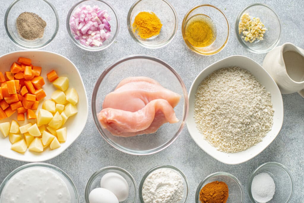 chicken katsu curry ingredients in bowls ready to start cooking