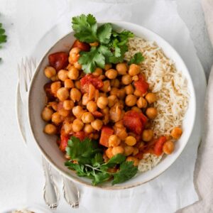 chana masala with rice in a bowl