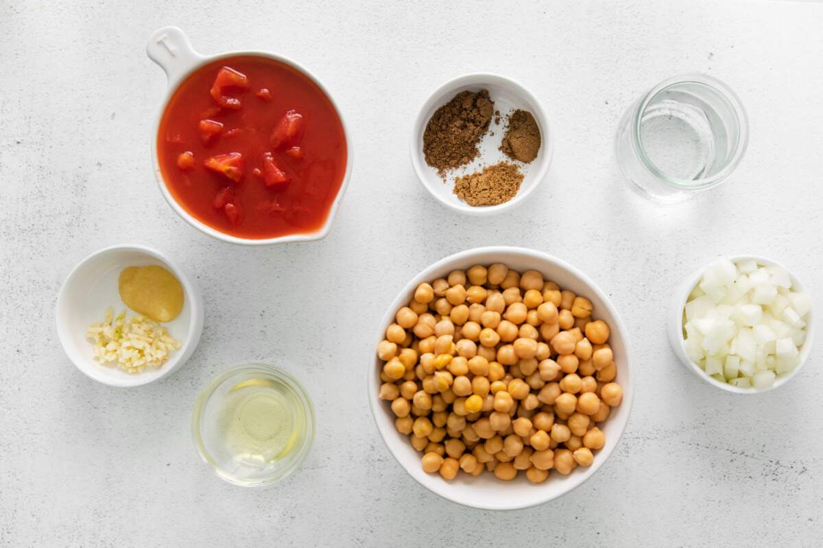 ingredients for chana masala in bowls