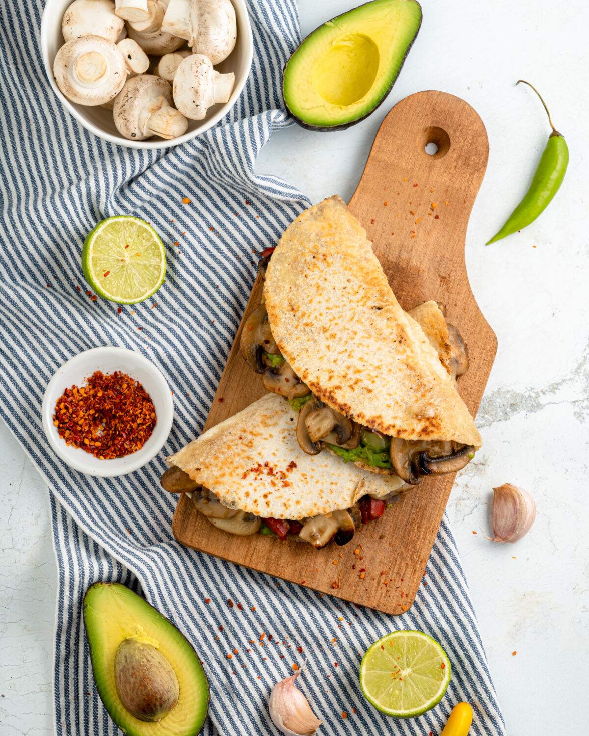 Mushroom Quesadillas with avocado, limes and garlic