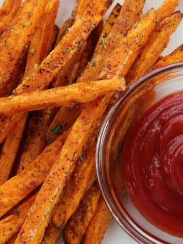 Baked sweet potato fries with a side of ketchup
