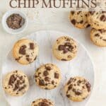 vegan chocolate chip muffins on a plate on a white background with flowers
