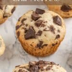 vegan chocolate chunk muffins on a white marble table top